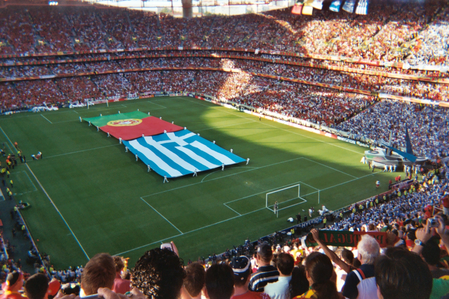 Flags of Portugal and Greece on the field of the UEFA Euro 2004 Final